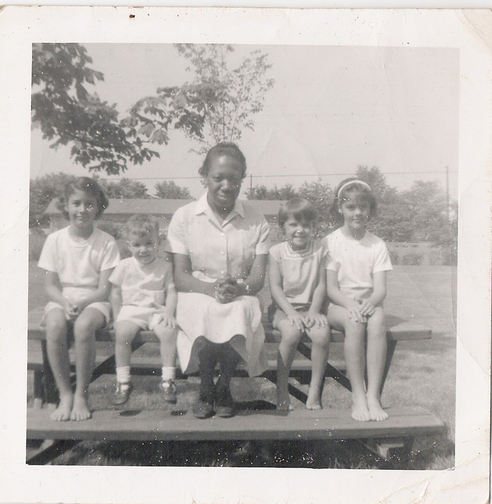 photo: my great-aunt in her day work uniform with the children she kept
