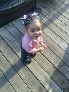 child with her hair braided